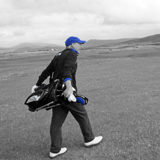 Andrew Shanley walking a golf course